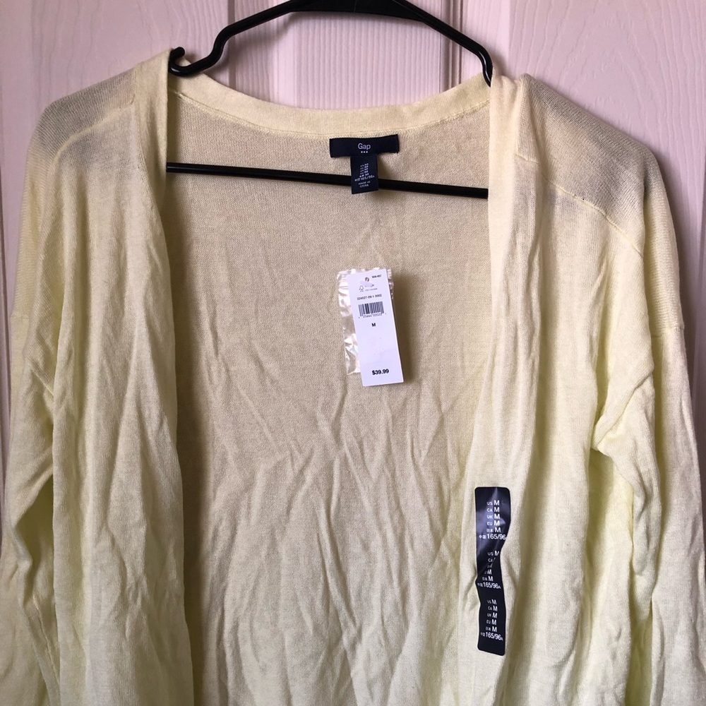 Womens cardigan. Never worn, with tag!!